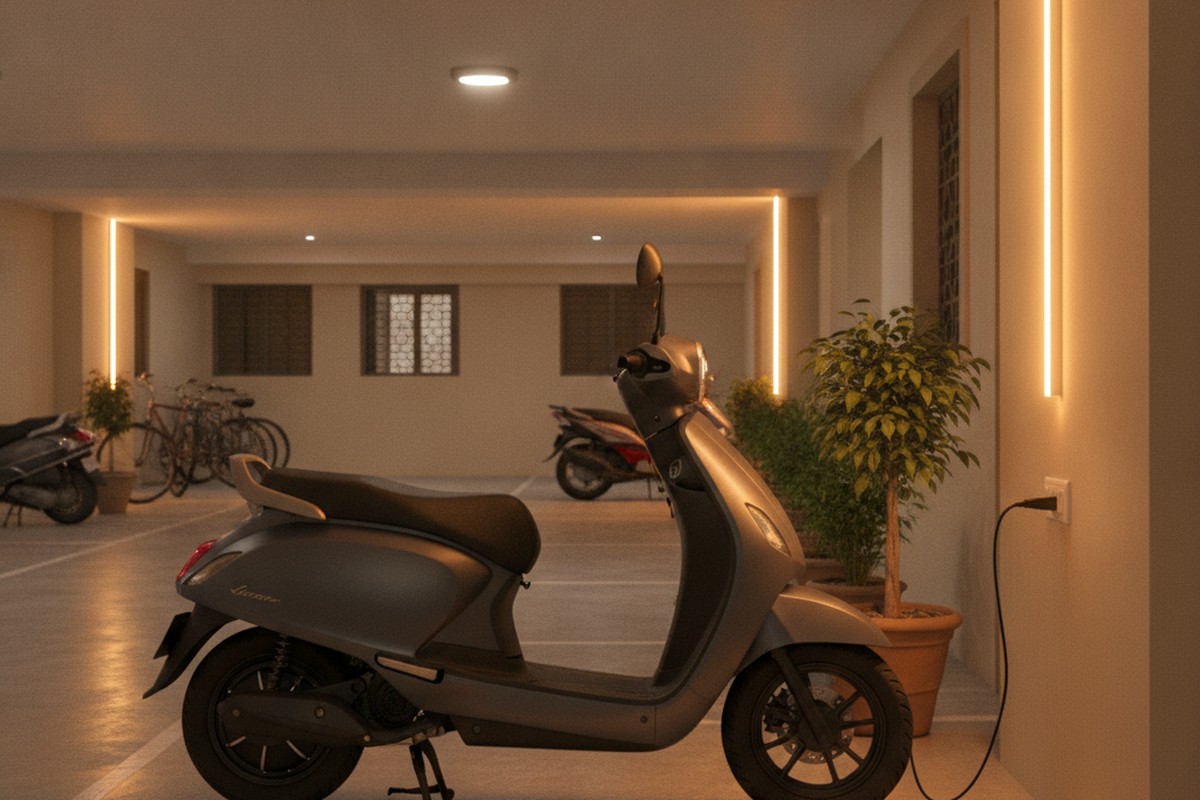 Electric scooter charging at home using a regular wall socket in an Indian apartment
